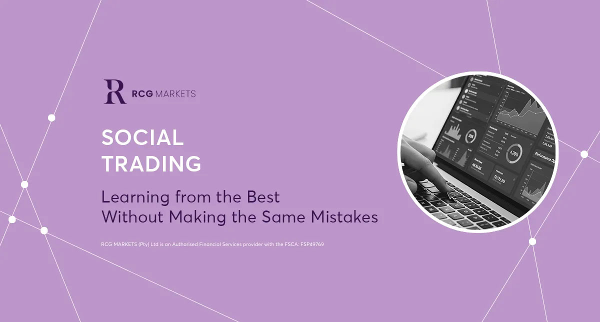 A person using a laptop for online trading